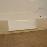 Notch cut tub to shower conversion in fiberglass