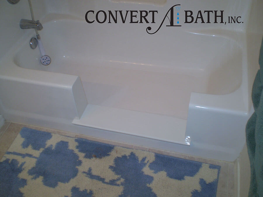 Notch cut tub to shower conversion in existing bathtub